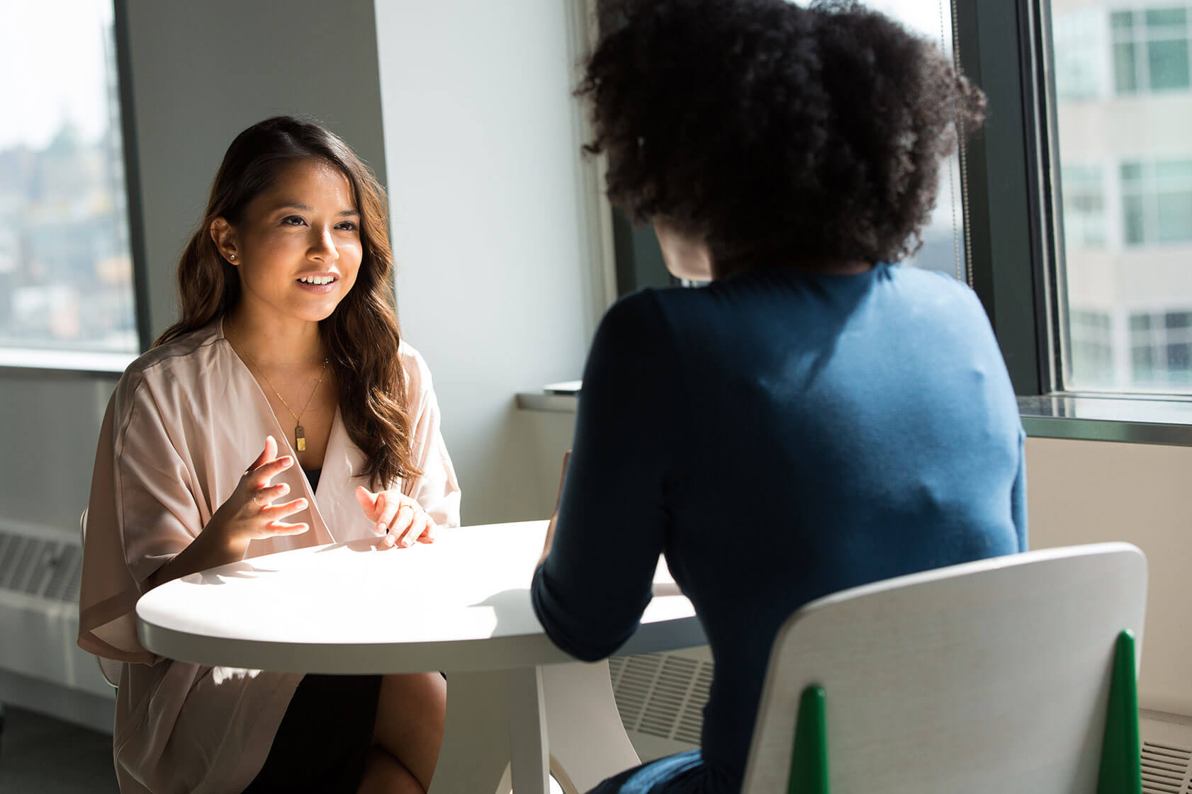 two women in an interview setting