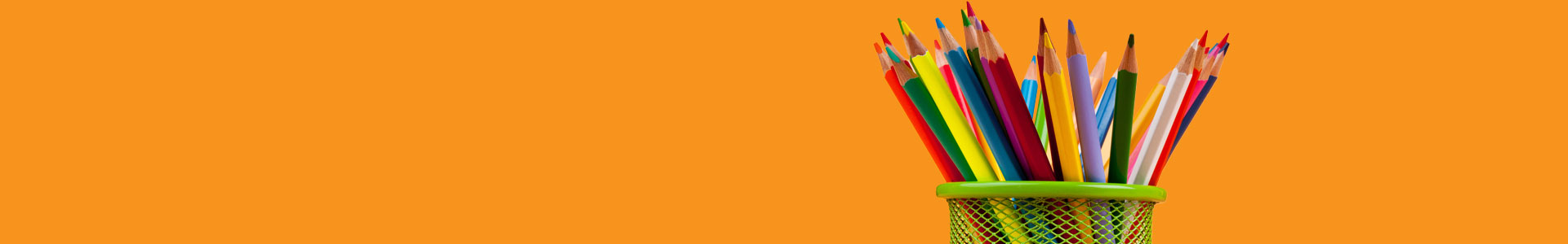 Colored pencils over an orange background